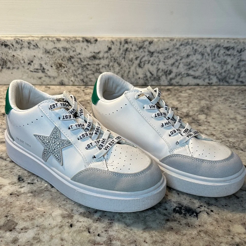 Vintage Havana platform sneakers with green accents.